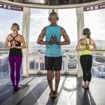 An hour of yoga inside a High Roller Ferris wheel pod costs $75.